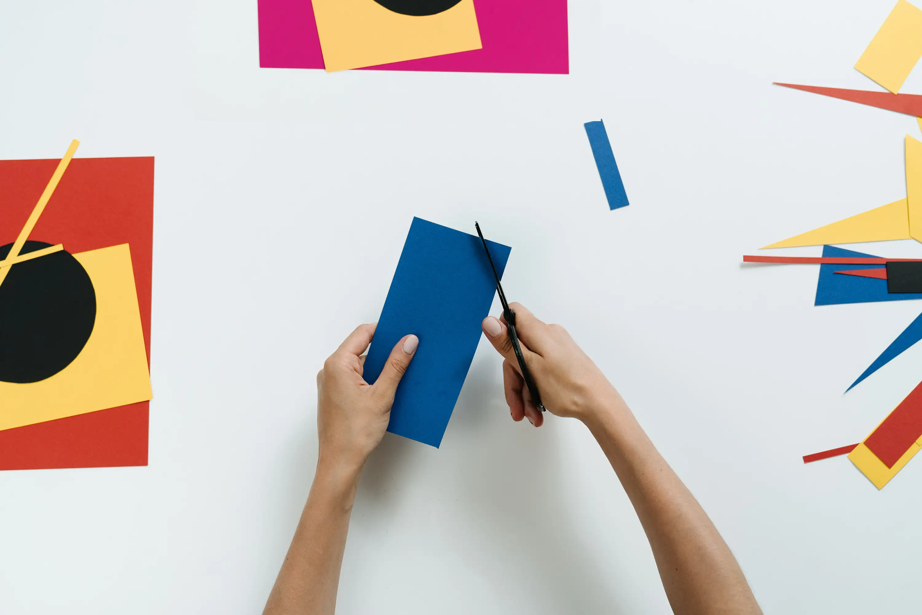 Simplify the management of your invoicing Hands cutting paper as a symbol of optimizing administrative tasks